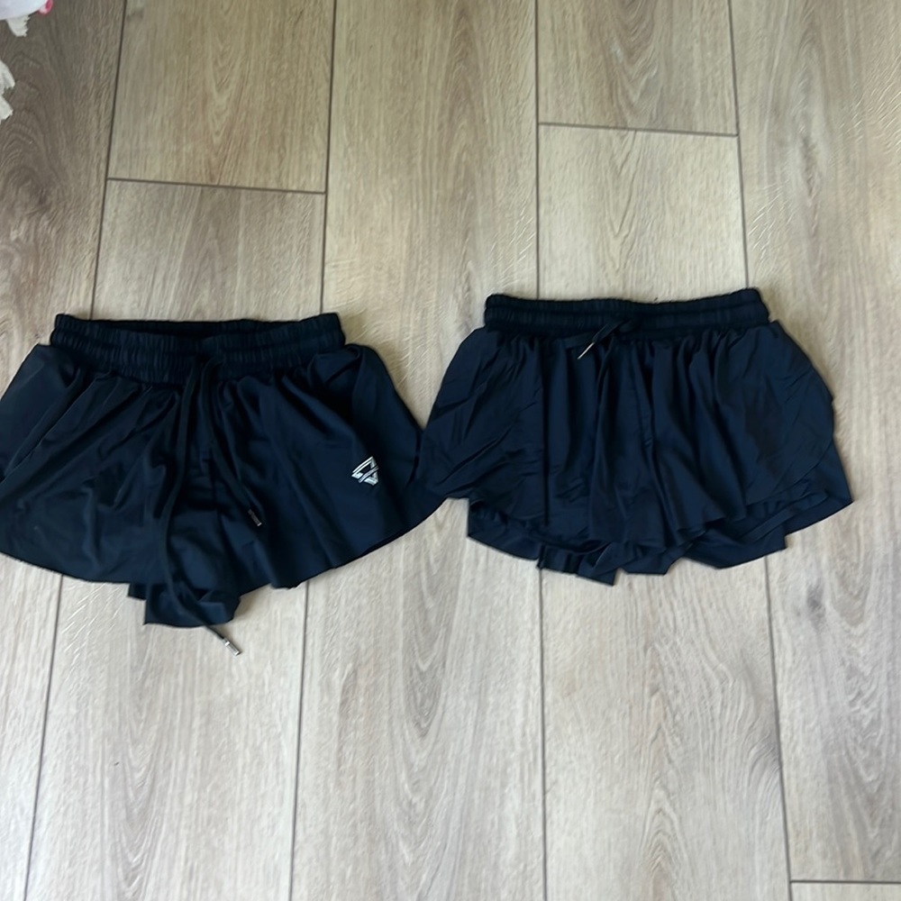 two black butterfly shorts